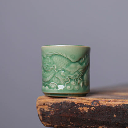 Authentic imperial style Longquan Celadon porcelain teacup with 3D carved dragon relief