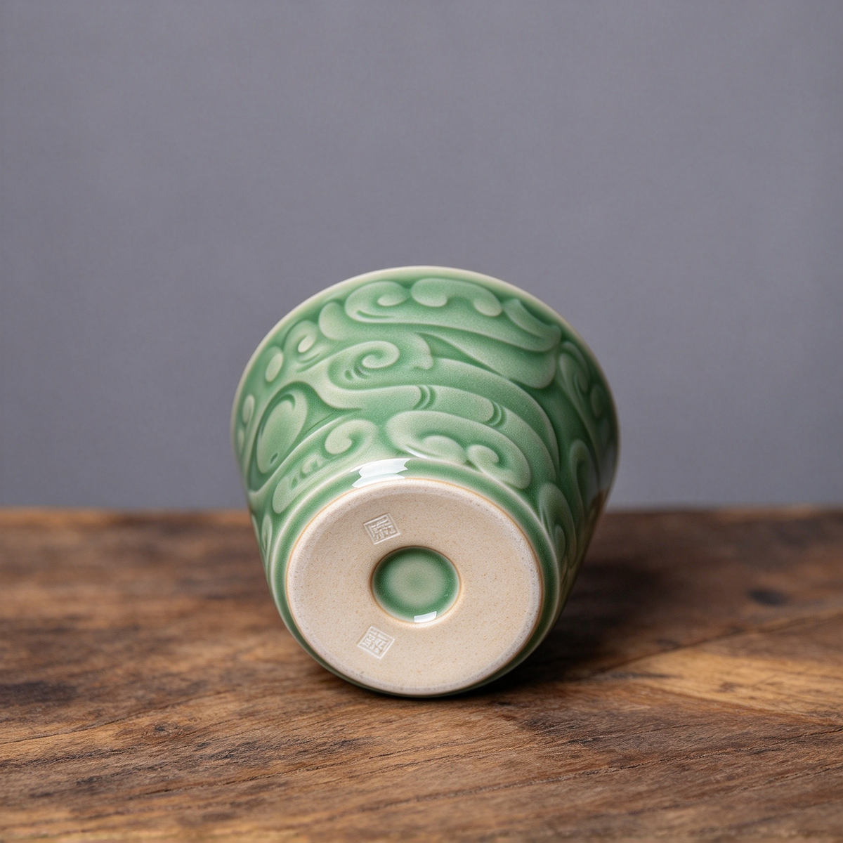 Authentic imperial style Longquan Celadon porcelain teacup with 3D carved bronze beast mask relief