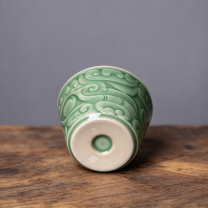 Authentic imperial style Longquan Celadon porcelain teacup with 3D carved bronze beast mask relief