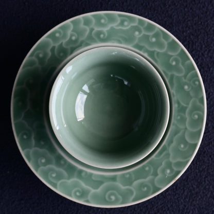 Chinese clouds pattern relief carved celadon teacup