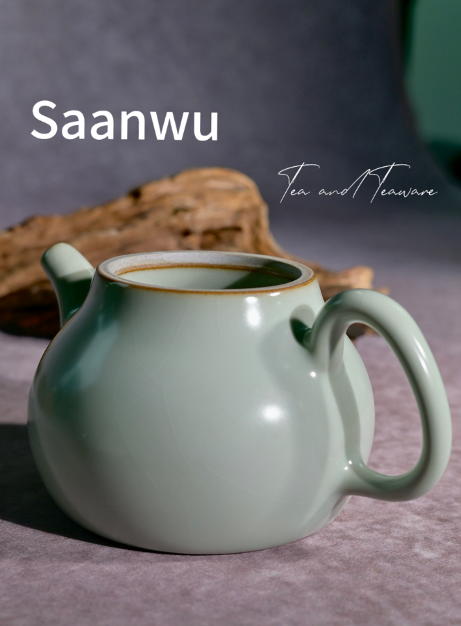 Side profile highlighting the sleek, classic pear-shaped silhouette of the Longquan Celadon teapot