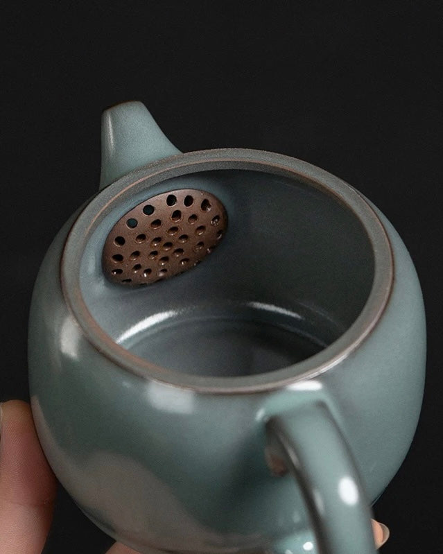 Wide mouth Longquan celadon teapot with smooth jade-like glaze