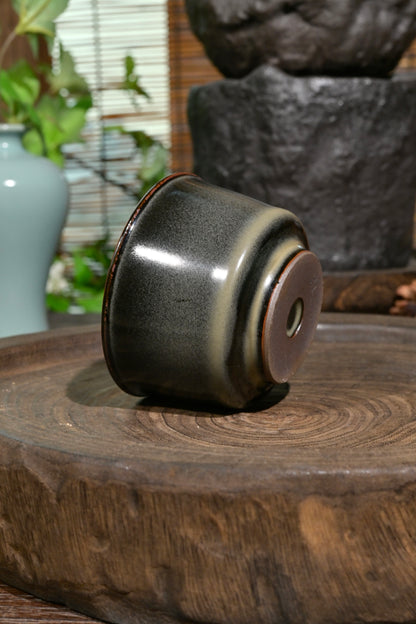 One-of-a-kind studio Longquan celadon 120ml tea bowl with dark clay body and subtle crystalline sheen
