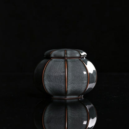 Longquan celadon Ge kiln tea canister with iron cyan glaze and natural gold thread iron wire crackle pattern