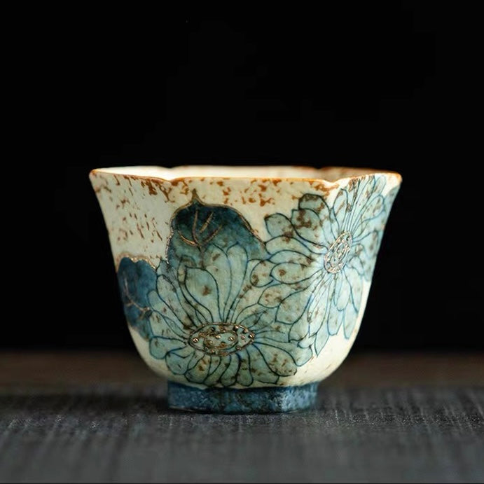 Old Clay Blue-and-White Volcanic Stone Caramel Glaze Tea Cup (45ml) with Hand-Painted Flora Design