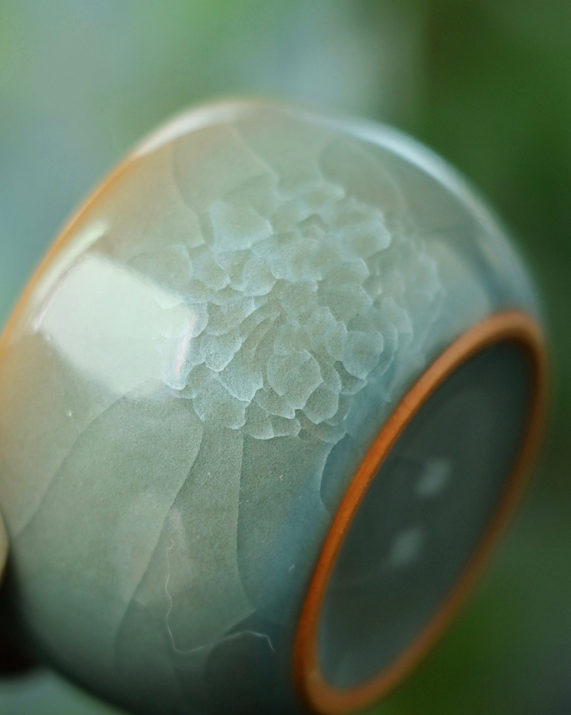 Soft sea-green celadon glaze color characteristic of traditional Longquan ware