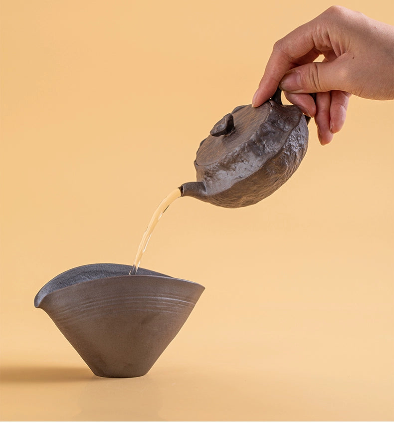 Wood-kiln-fired teapot featuring wabi-sabi aesthetics