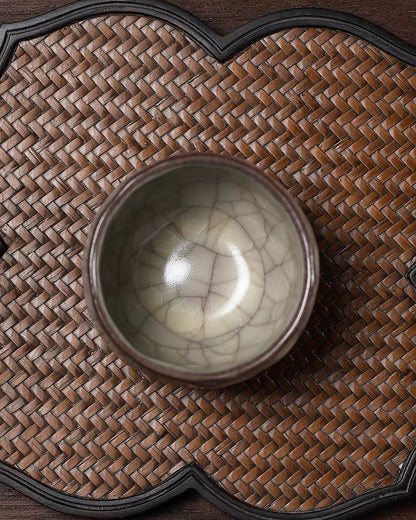 Oily lustrous celadon surface with thick unctuous quality and soft greasy sheen prized in Ge tradition