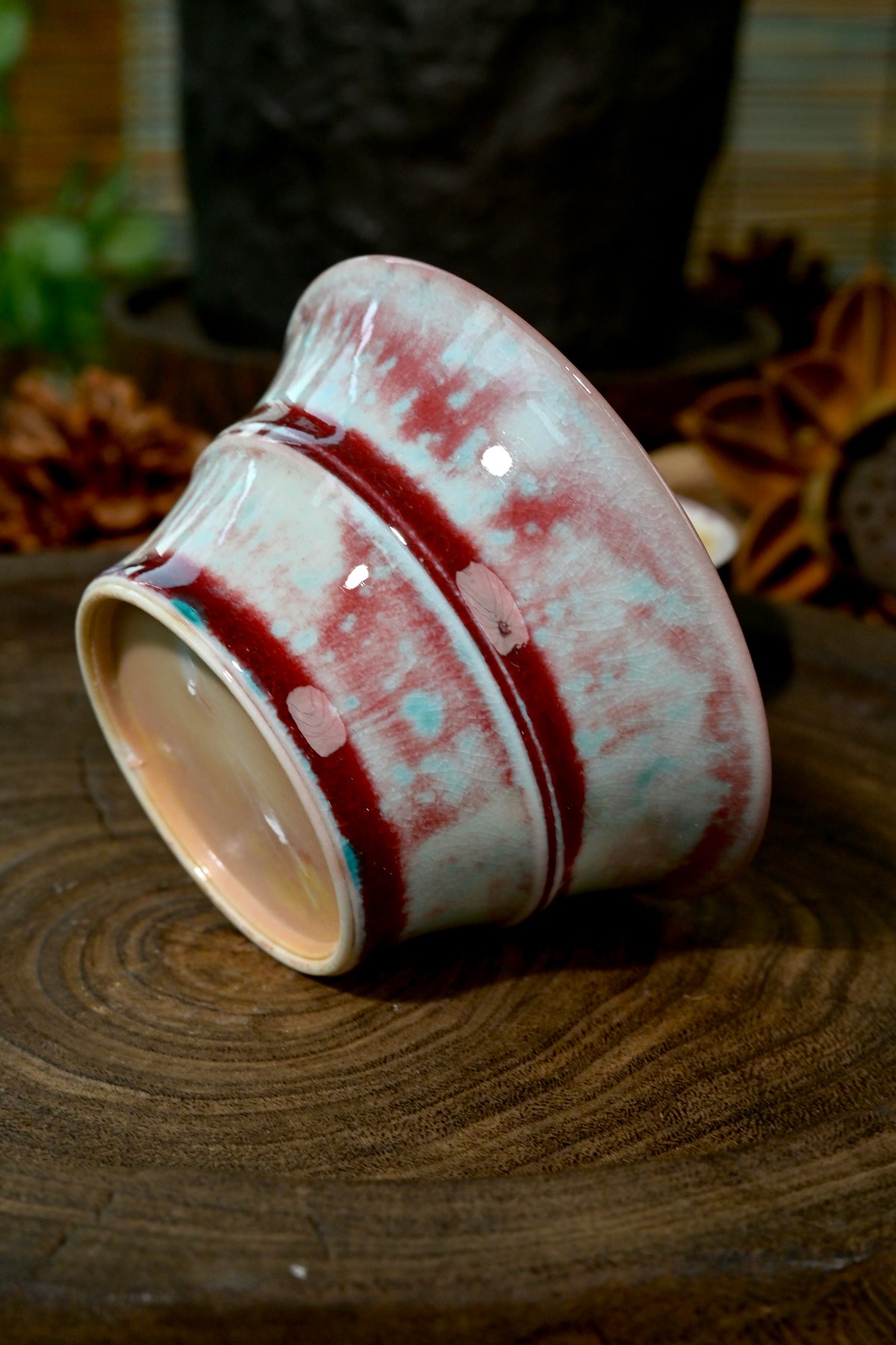 Side profile of wood-fired soda glaze Gaiwan showing raised ergonomic bamboo joint ridges