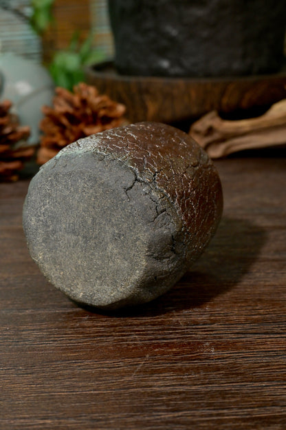 Side profile of 110ml Wabi-Sabi teacup showing tactile volcanic rock ridges and smooth rim
