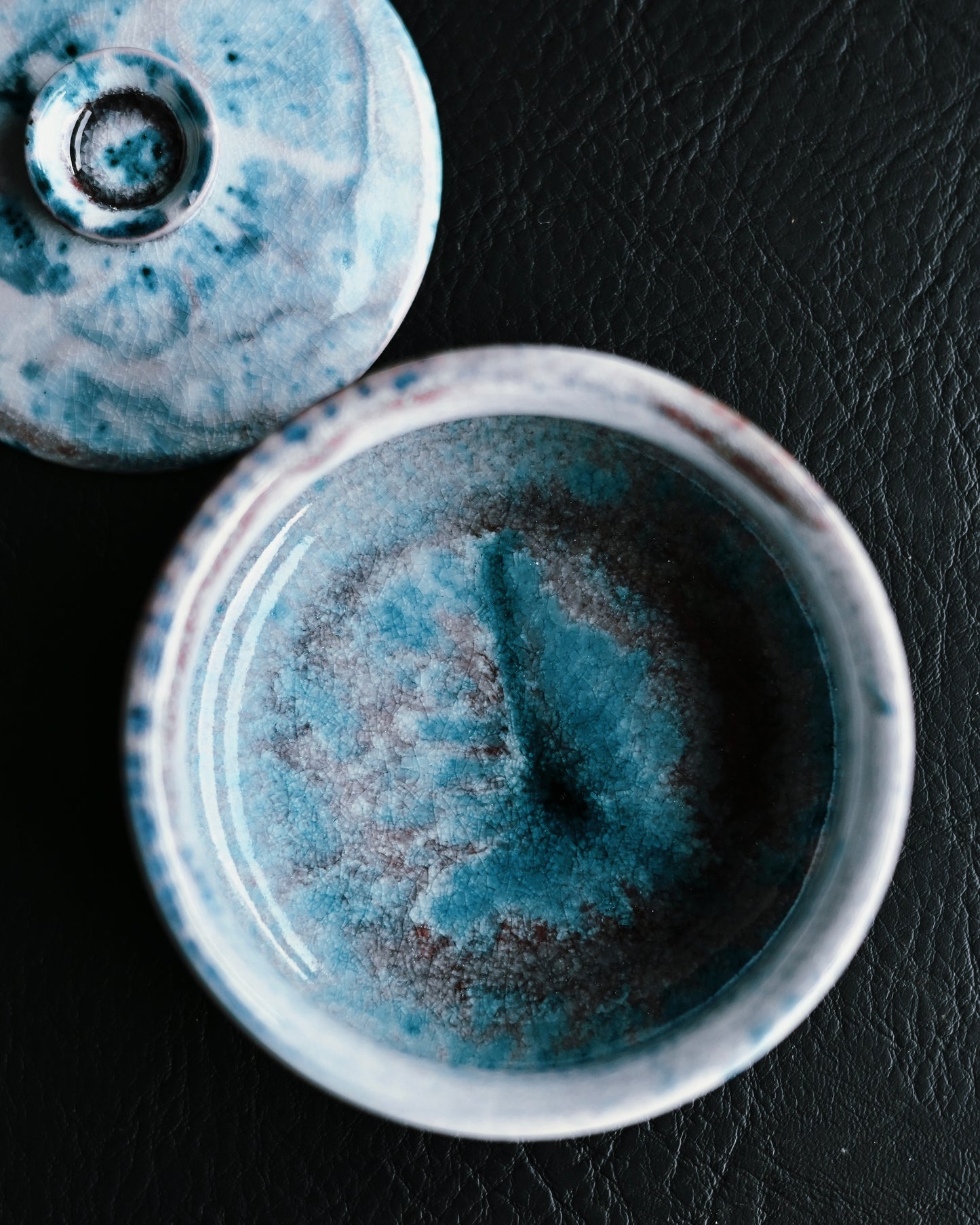 Individual veining and color variation in the glaze, highlighting the uniqueness of each handmade bowl.