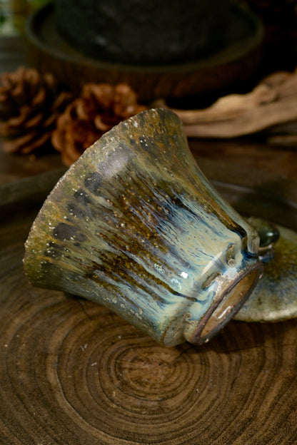 Front view of 150ml wood-fired coarse stoneware gaiwan showing irregular organic rim profile