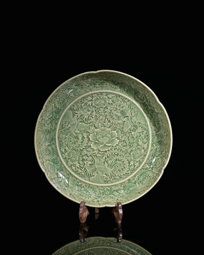 Phoenix as empress symbol and peony as flower king on olive-green glazed celadon dish