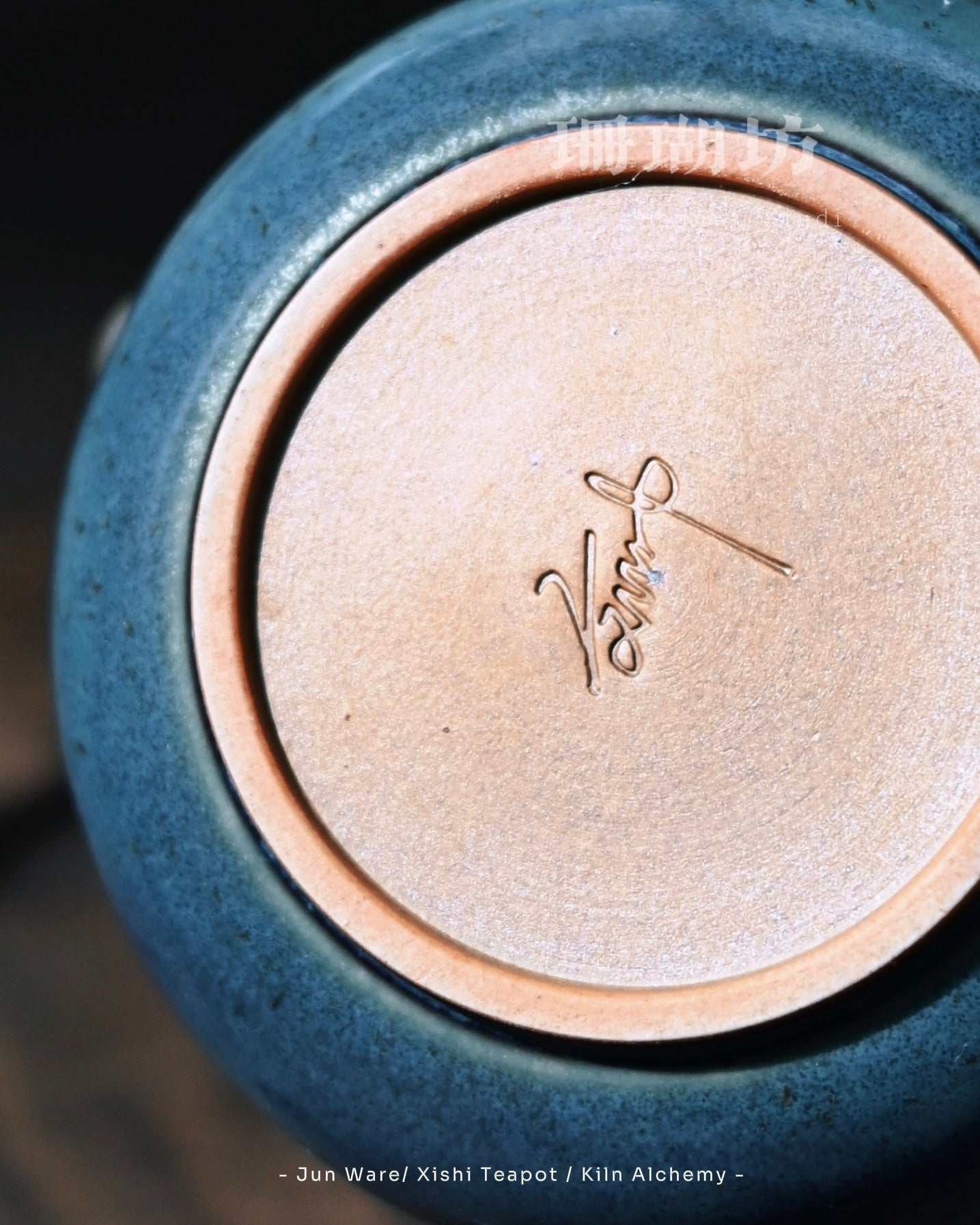 Pine-green glaze with blue undertones and natural star-like carbon spots formed during reduction firing