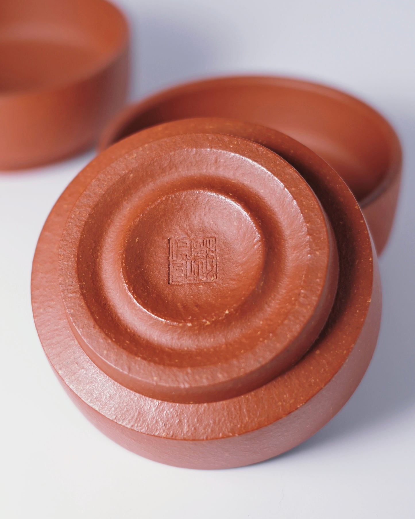 Naturally porous clay structure allowing tea oils to penetrate and improve flavor over time