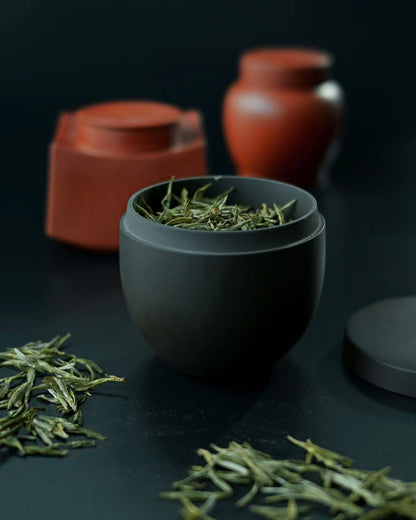 Handcrafted Yixing travel tea caddy with natural clay finish, perfect size for personal tea sessions outdoors
