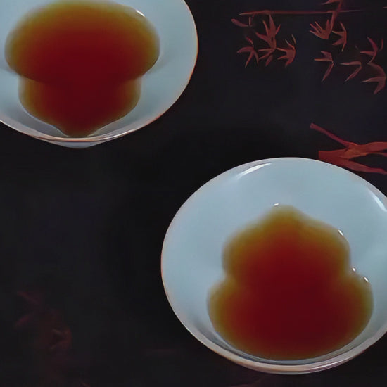 Premium Ru kiln porcelain tea cup with layered crackle glaze, blending symbolic design with timeless tea culture.