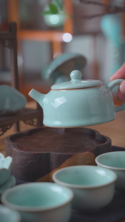 Lifestyle banner shot of the complete Ru Kiln Sky-Cyan Gongfu Tea Set ready for tea tasting.