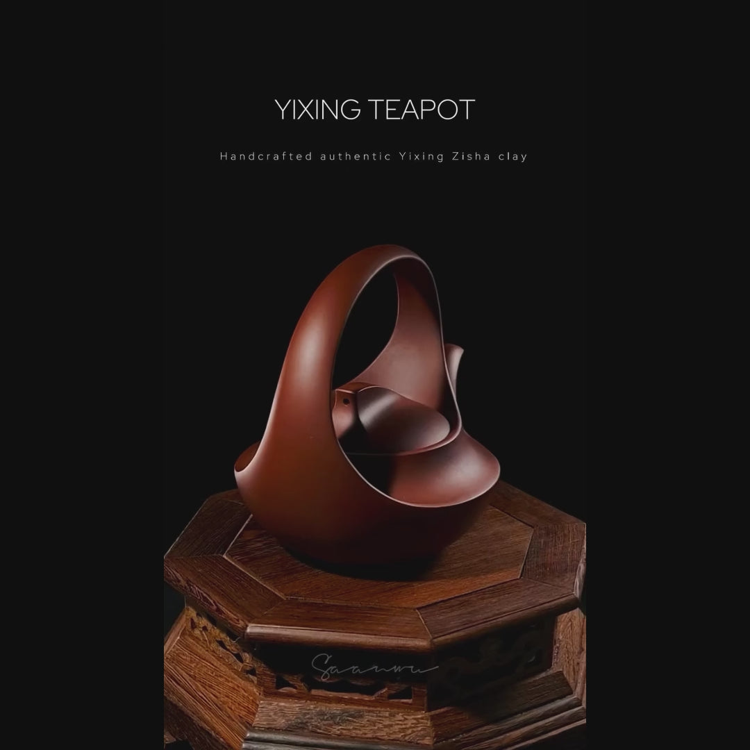 Load video: Hand-signed Yang Junbao Qu teapot crafted from rare aged Zisha clay, showcasing artisan details and collector-level craftsmanship.