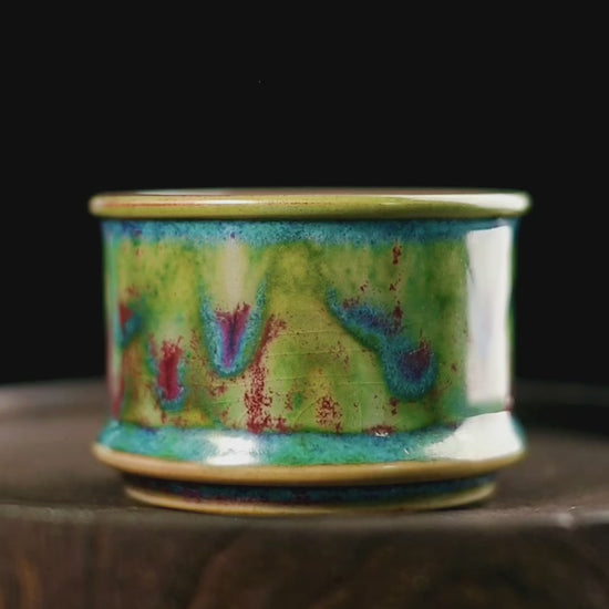 Handmade Jun ware teacup with magical green flambé glaze, horsehoof shape, and crackled texture for Chinese tea ceremony