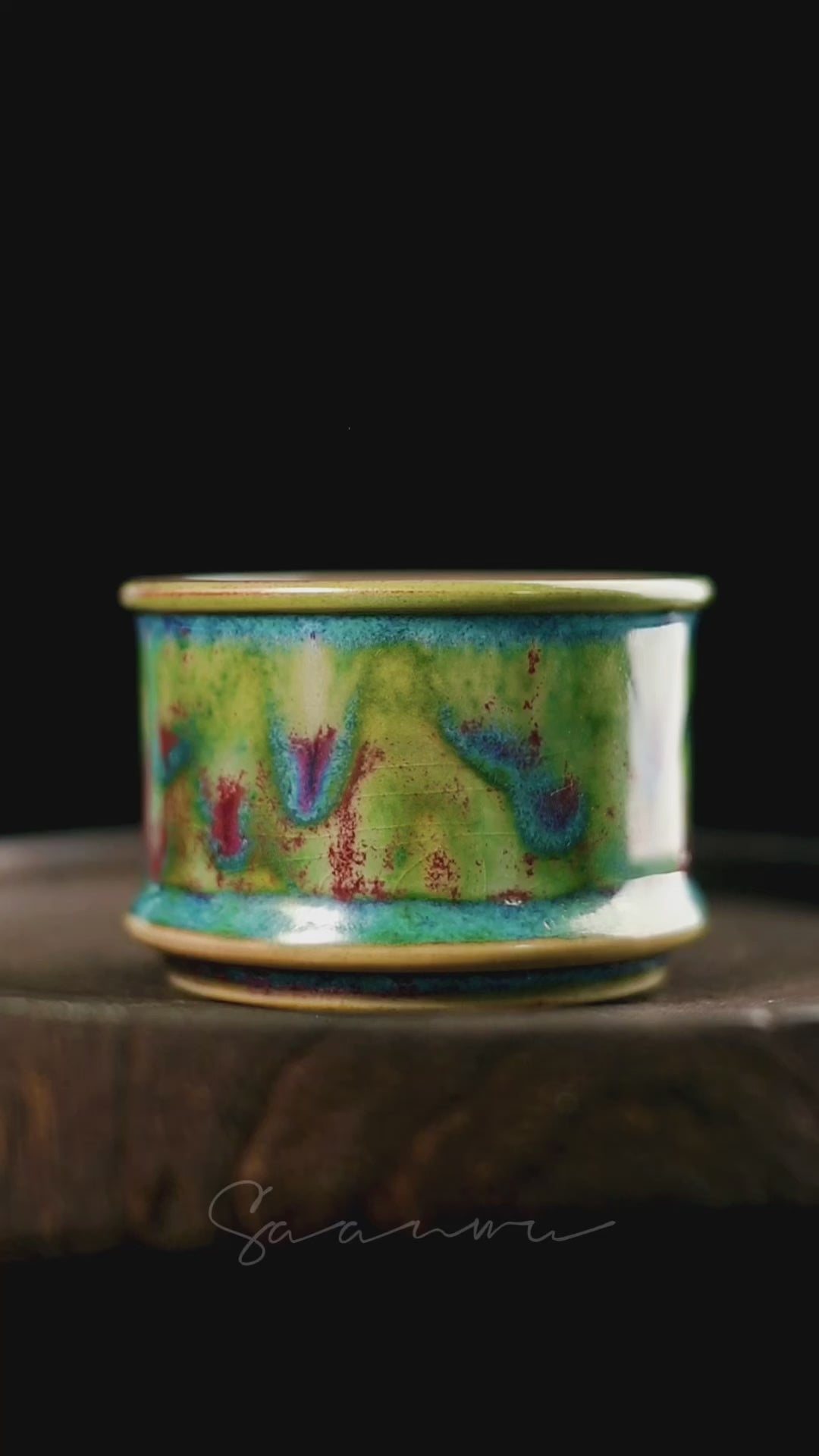 Handmade Jun ware teacup with magical green flambé glaze, horsehoof shape, and crackled texture for Chinese tea ceremony