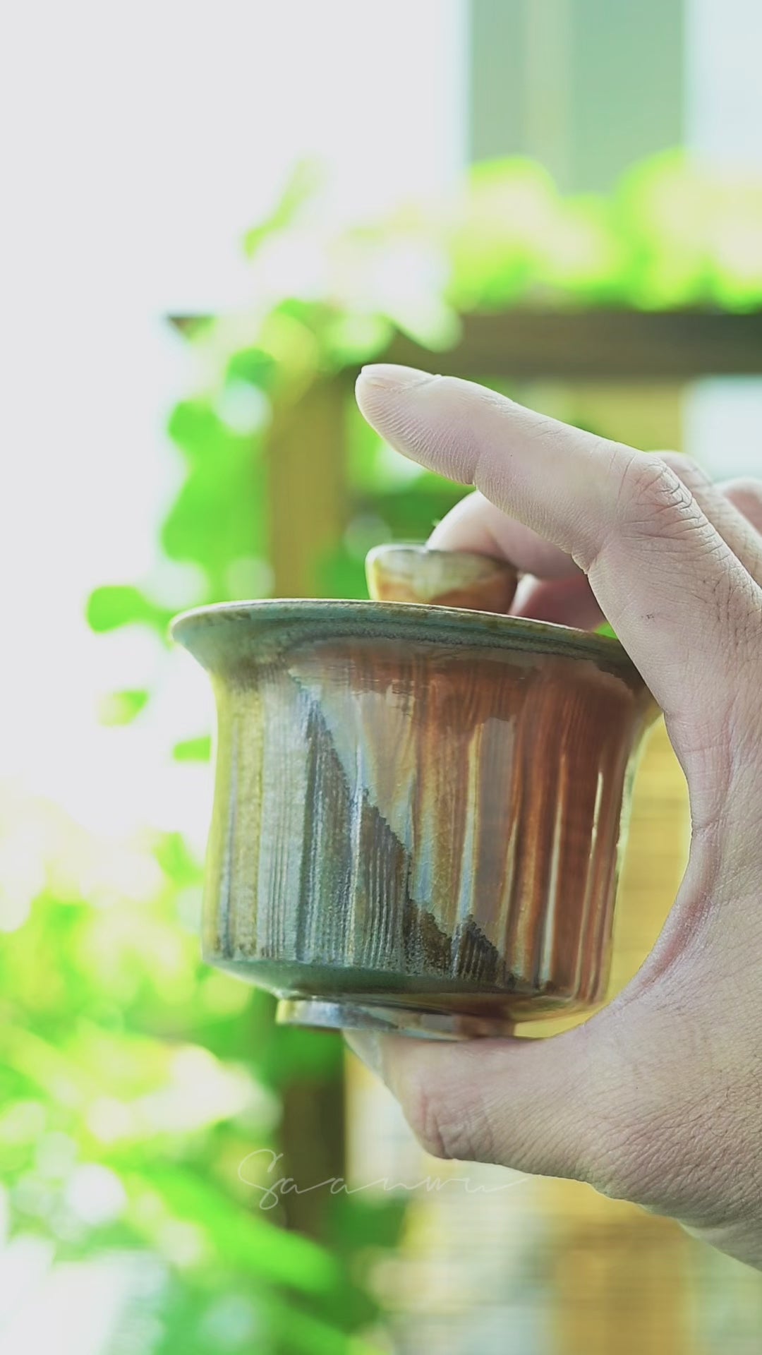Handcrafted wood-fired natural ash glaze gaiwan perfect for oolong tea brewing.