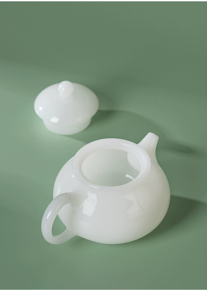 Fine white porcelain teapot featuring a jade-like sheen