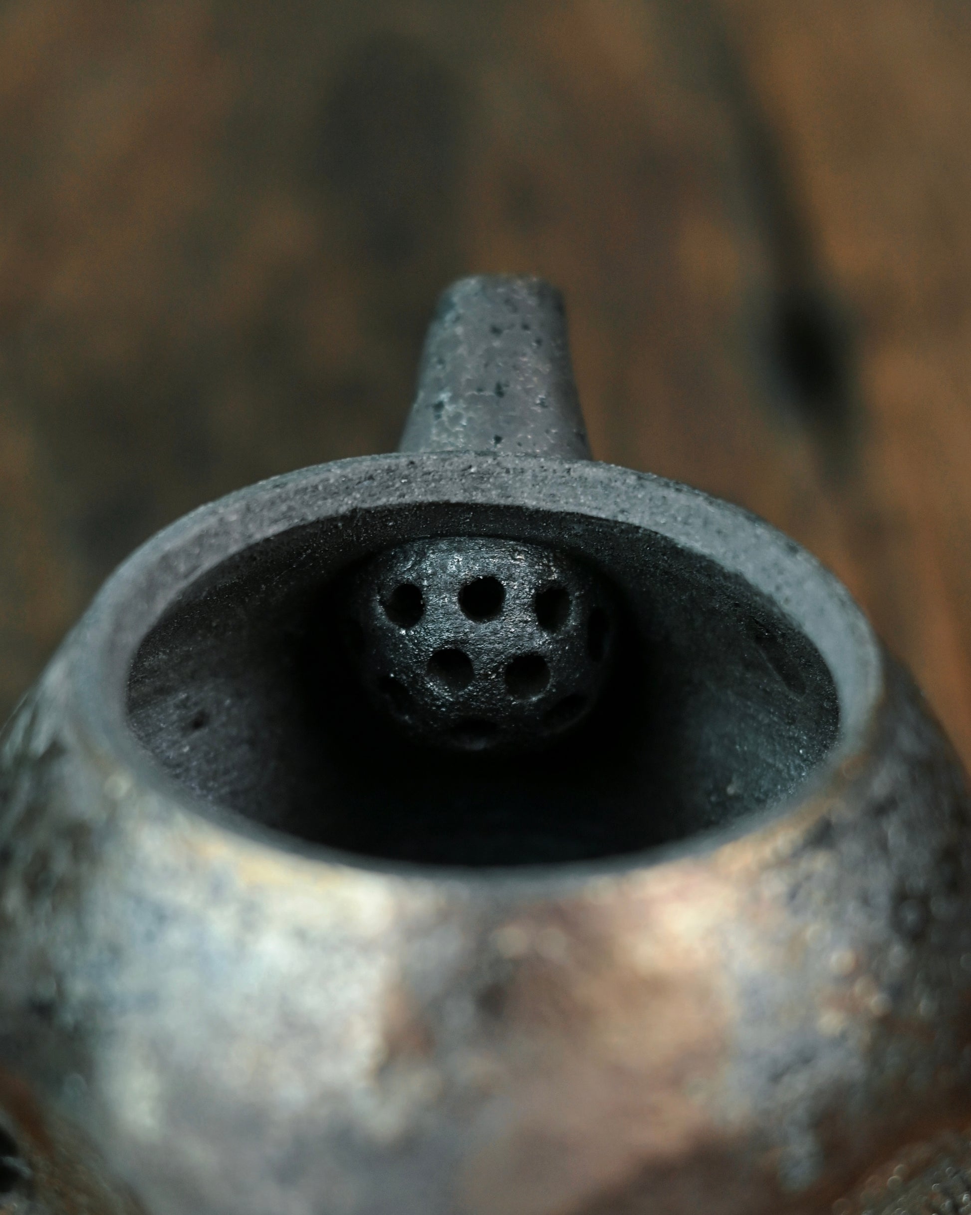 Raw clay material showing unglazed body that develops character through repeated use