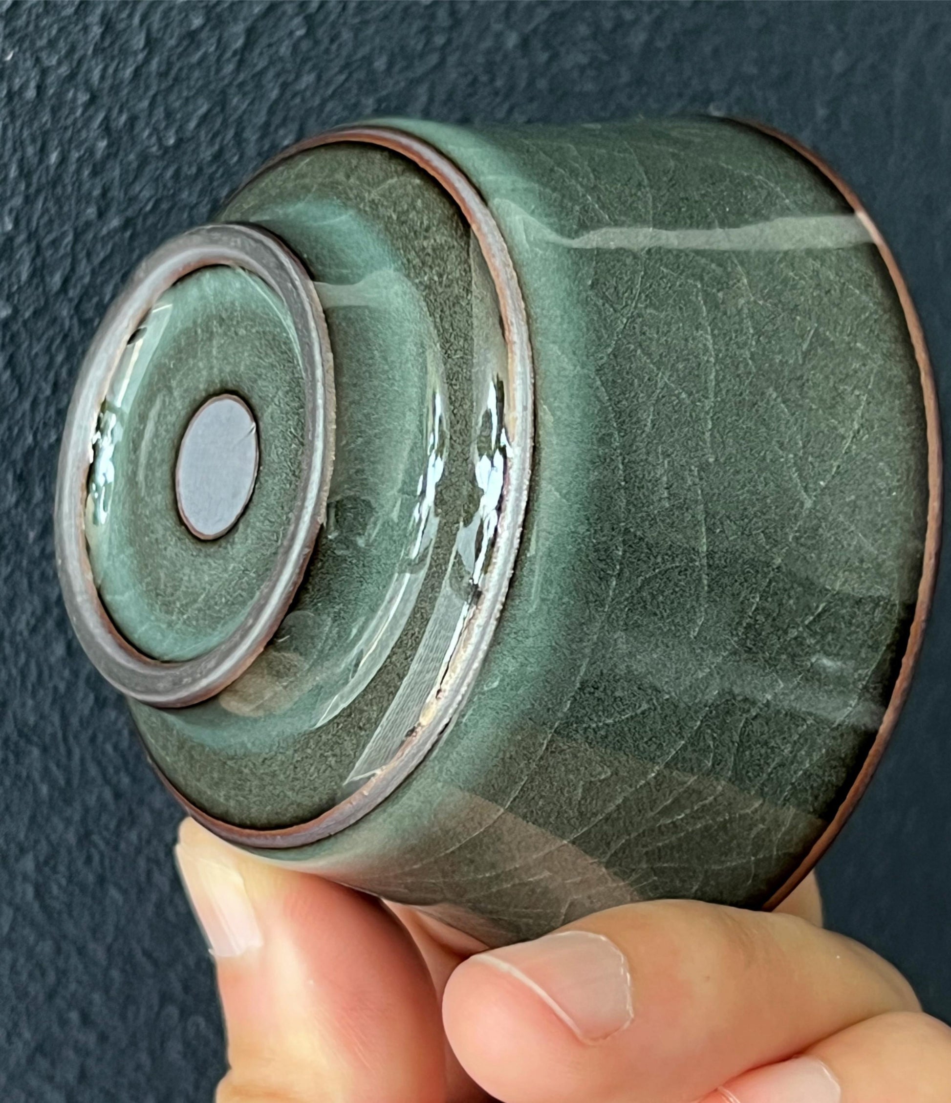 Iron clay celadon showcase a dark tone and crackle surface