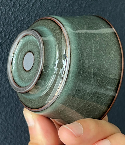 Iron clay celadon showcase a dark tone and crackle surface
