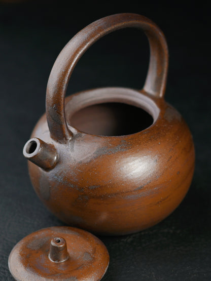 Théière à poignée au design archaïque en argile grossière de style rétro