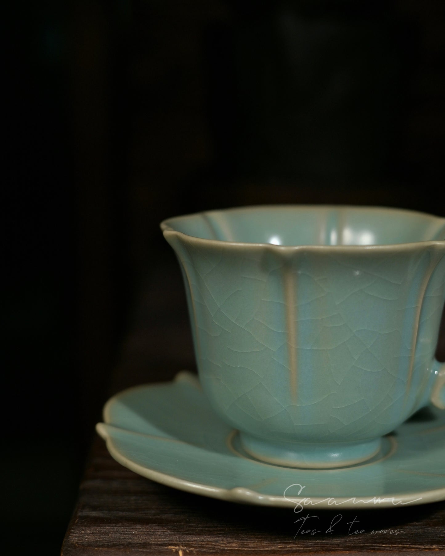 Ru‑celadon ceramic craft piece with elegant ornate curved handle, timeless Chinese hand‑made artware