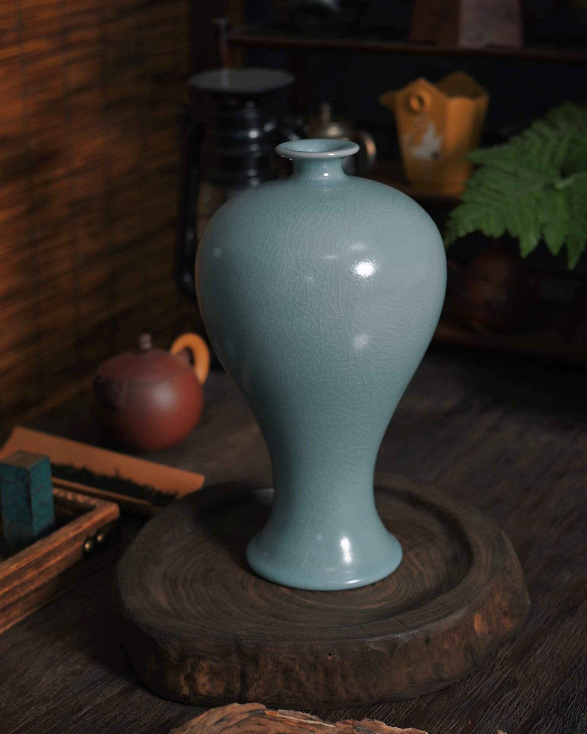 Small mouth vase design historically used for displaying single plum branches