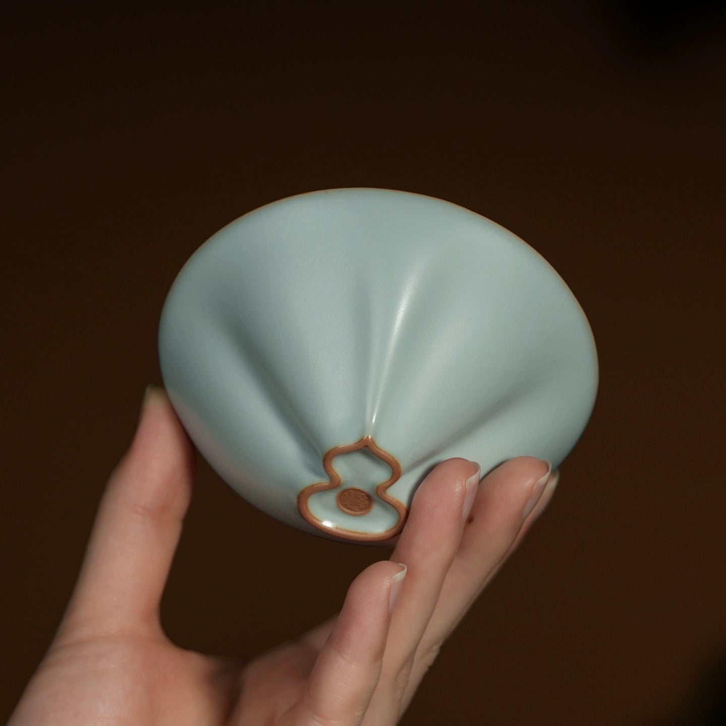 Traditional douli-style Ru kiln teacup with expressive crackle glaze, each piece uniquely patterned by firing.