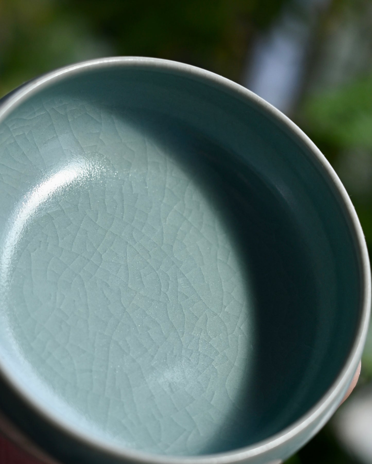 Ru ware dicada-wing crackle glaze pattern forming fine veining across the luminous celadon surface