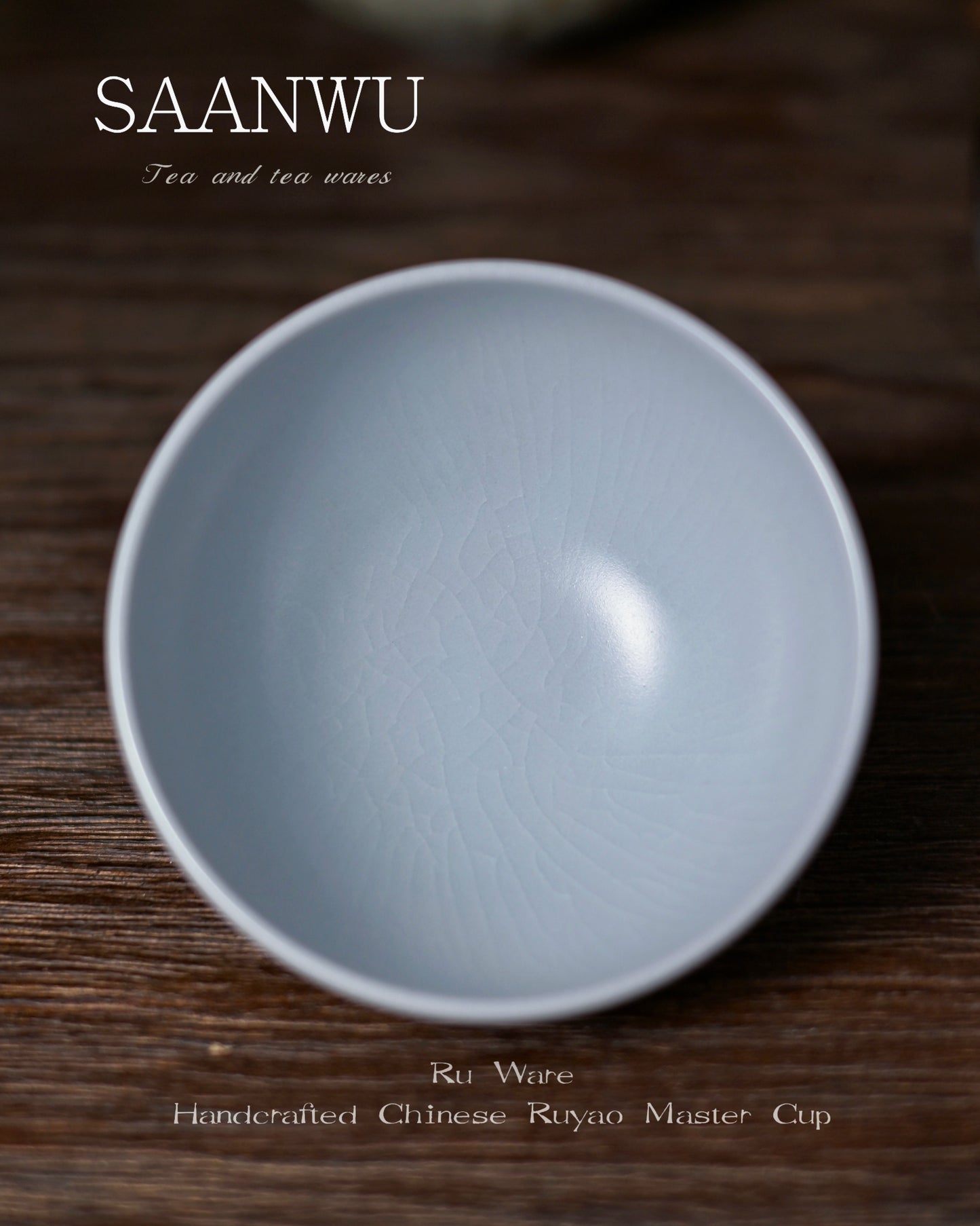 Ru kiln classic moon-white glaze appearing almost white in bright light with soft blue-grey undertones in shadow