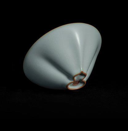 Authentic Ru ware celadon teacup with refined crackle patterns and a symbolic gourd silhouette, ideal for gongfu tea rituals.