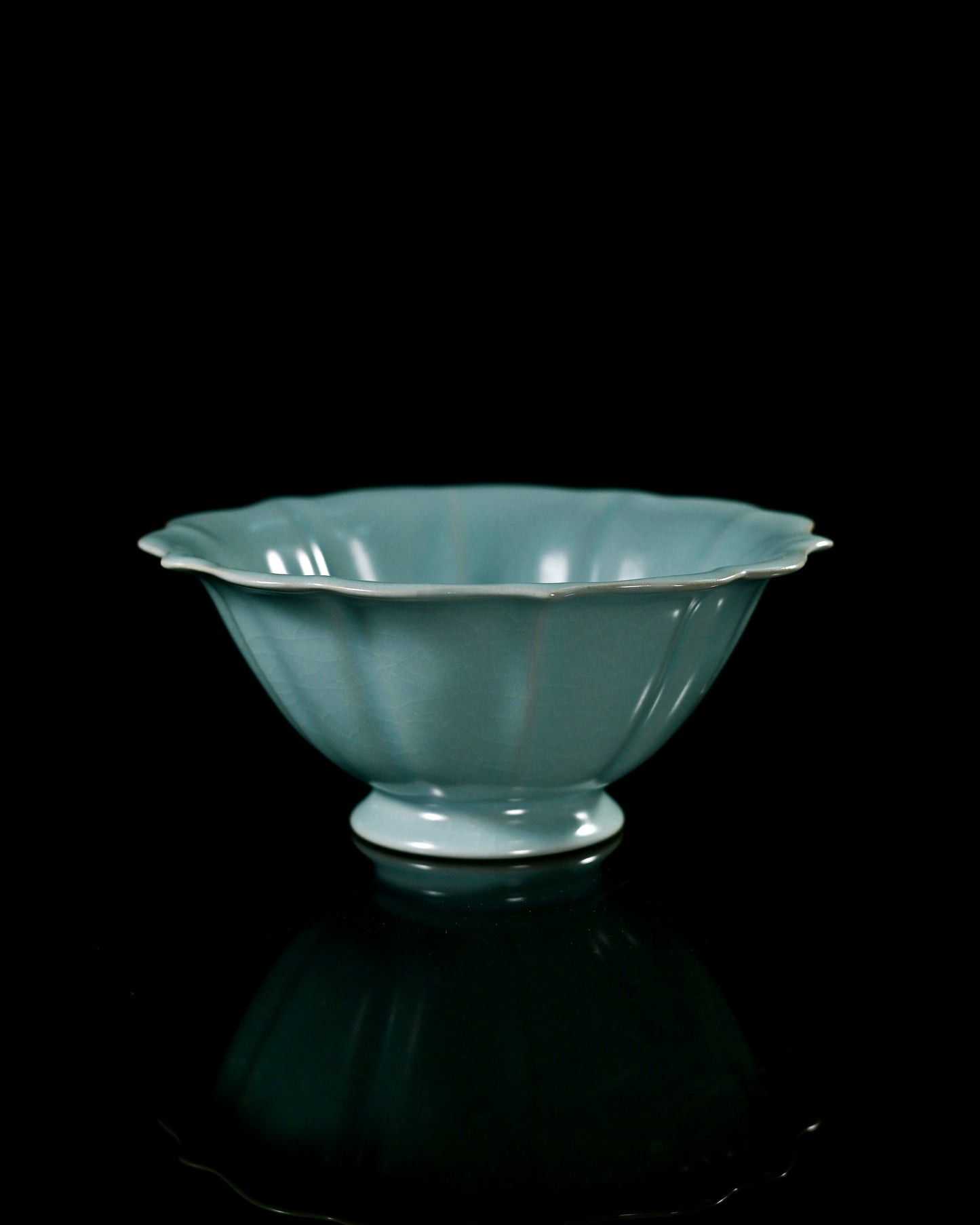 Cicada-wing crackle glaze unique to Ru ware, formed during controlled cooling process