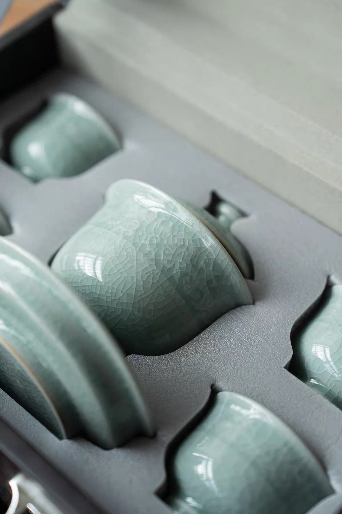 The Ru Kiln porcelain travel tea set neatly packed inside its compact protective storage bag.