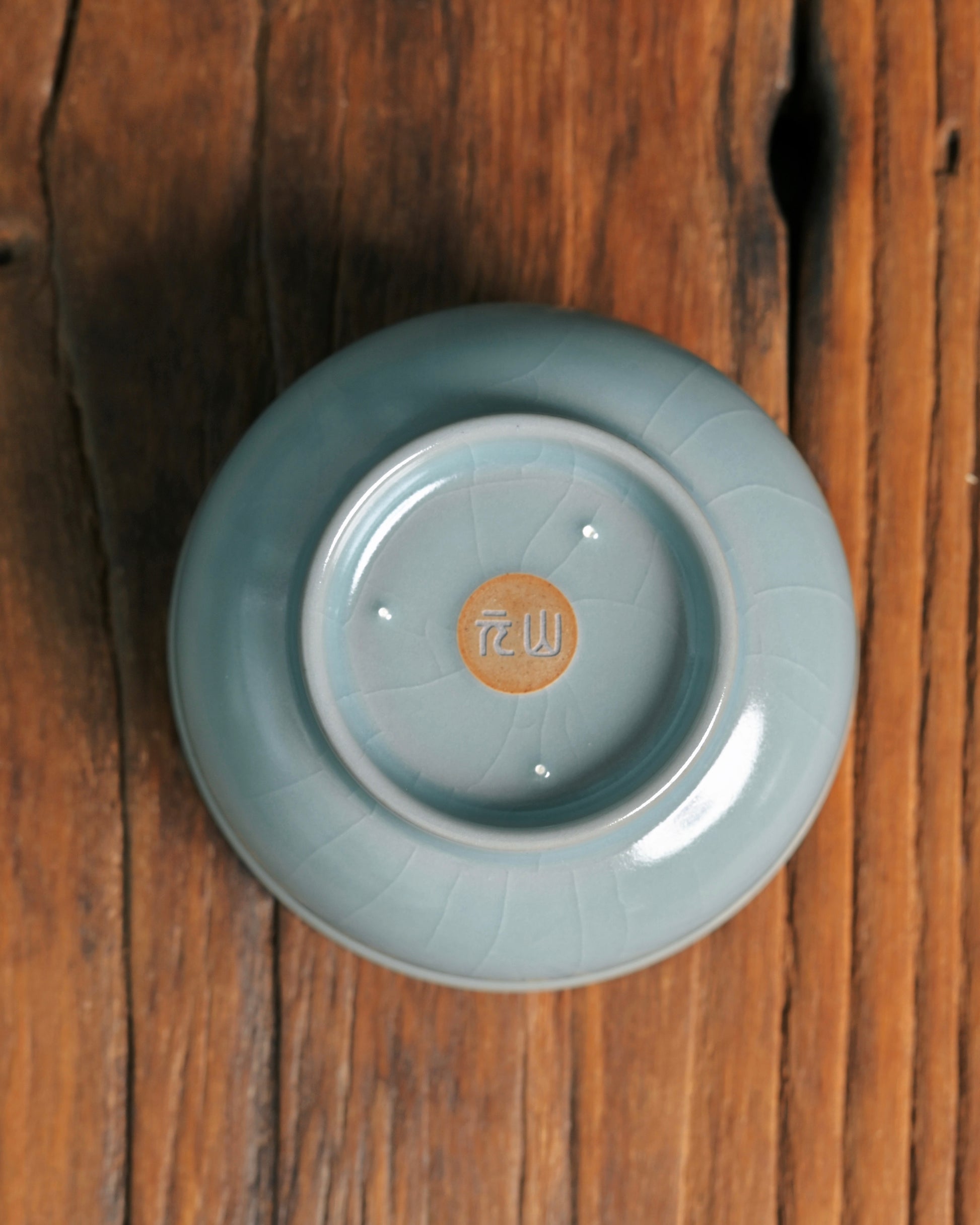 Sky-blue celadon glaze teacup with agate-infused glaze