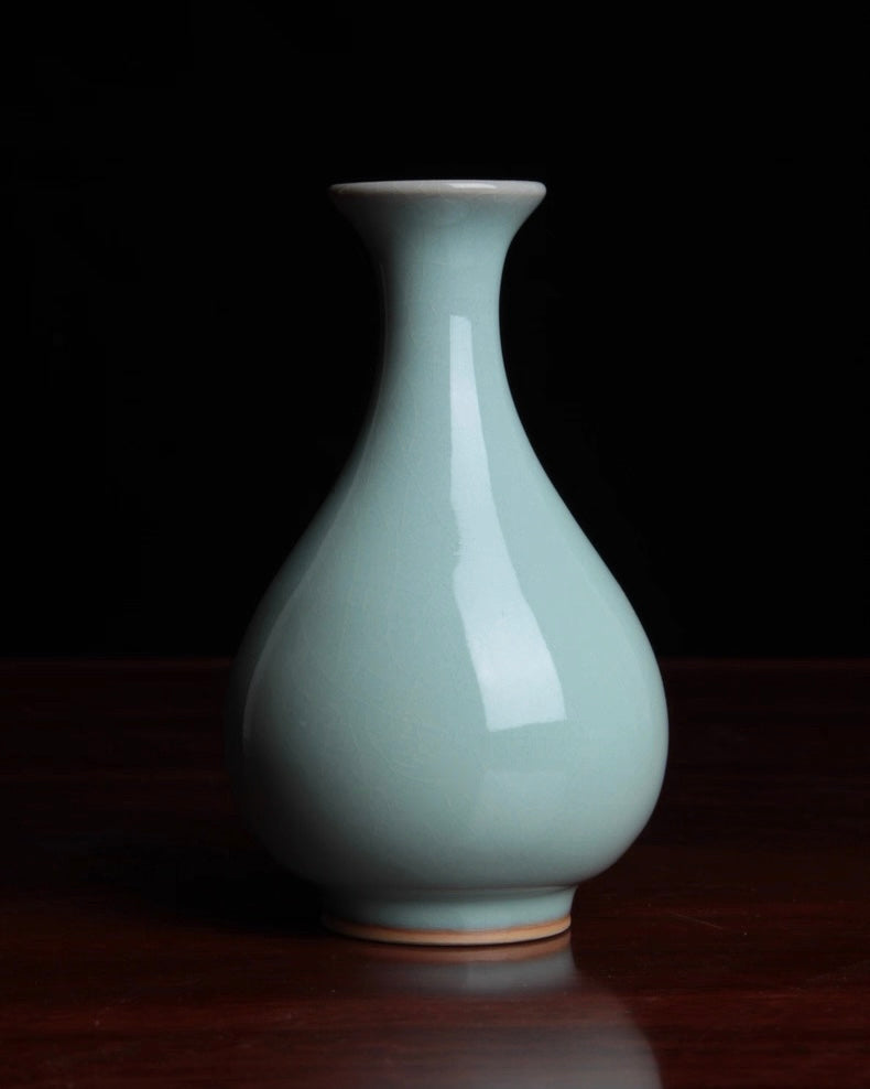 Ru ware glegant curvature design balancing upright stature with graceful flowing lines