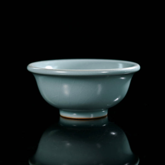 Ru porcelain cup with classic sky-blue glaze and substantial thick body, featuring traditional ring-foot firing technique
