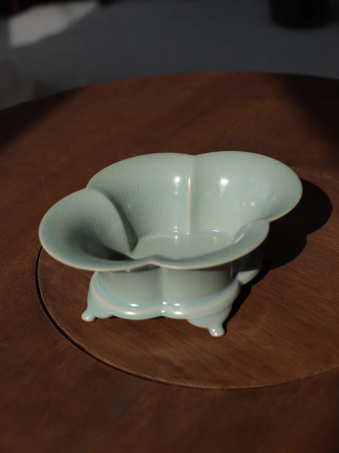 Sky-blue Tianqing Ru Ware water basin showing smooth ceramic curves and multi-purpose versatility