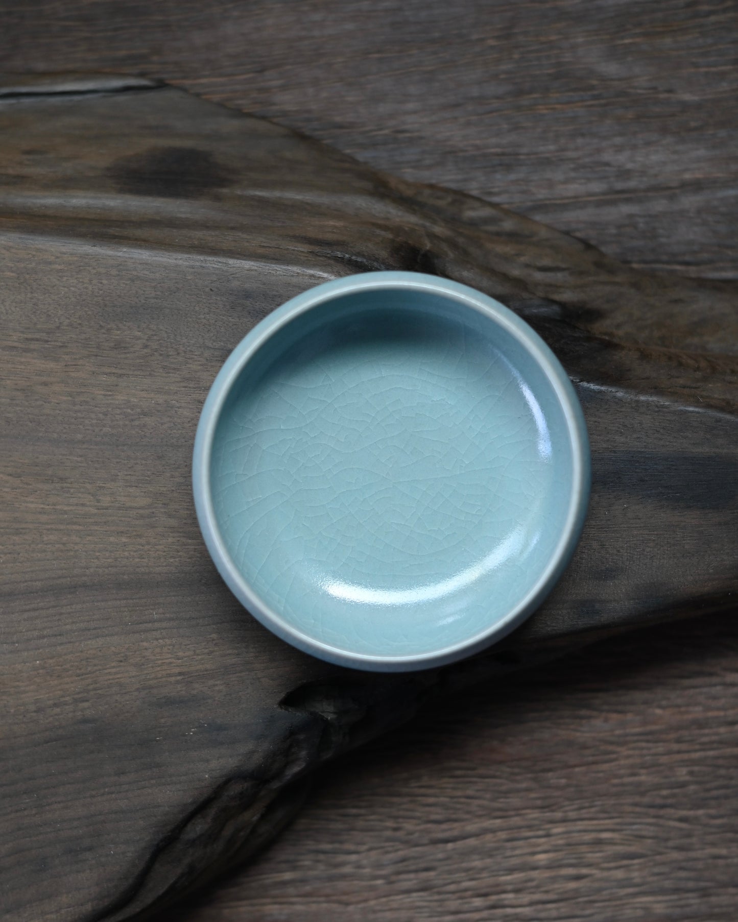 Agate-infused celadon glaze creating the characteristic translucent "sky-after-rain" Ru ware color