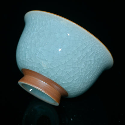 Traditional Ru kiln teacup with translucent glaze revealing fine crackle texture