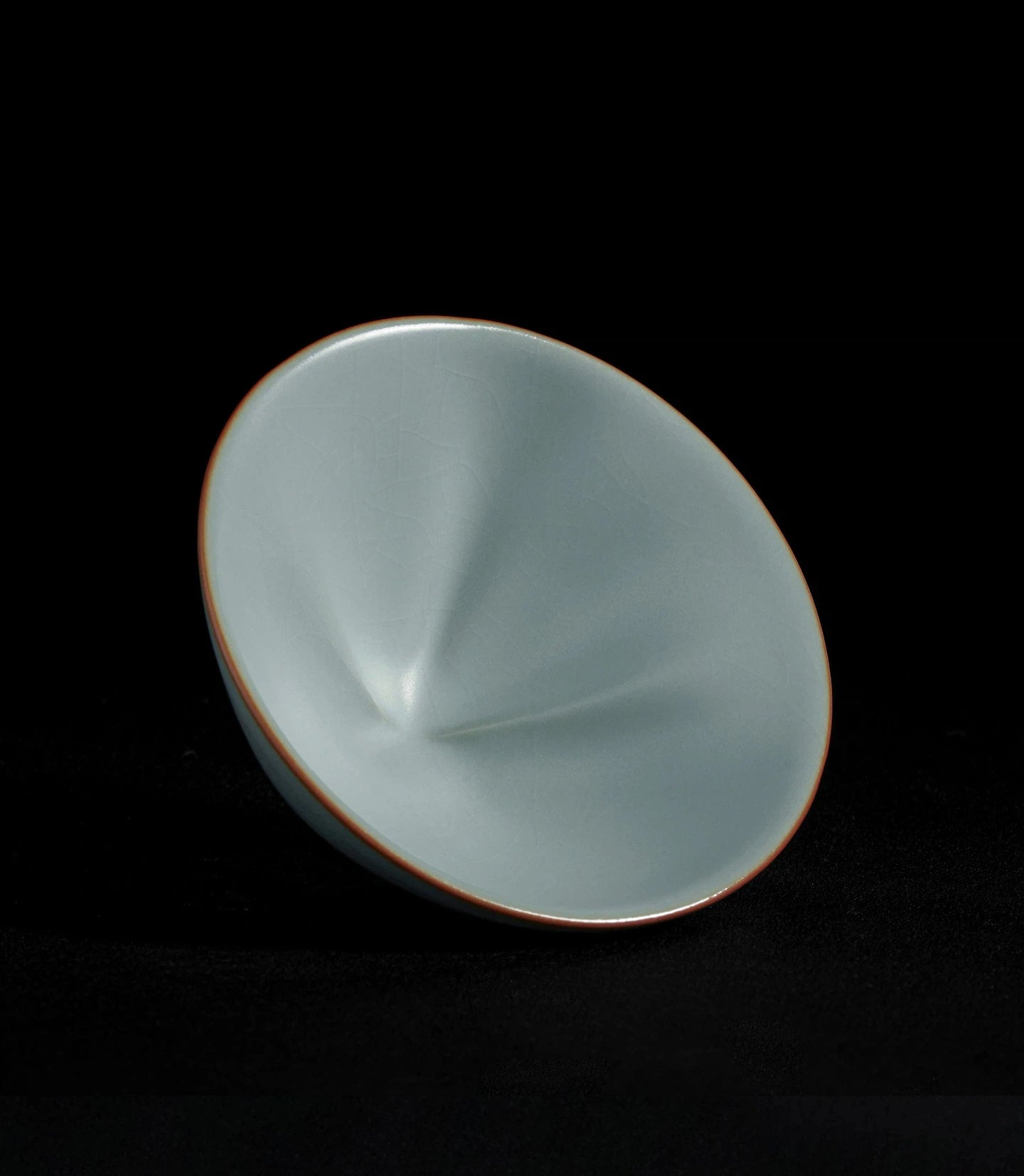 Artisan-crafted Ru kiln tea cup with evolving crackle glaze, combining douli shape and auspicious gourd symbolism.