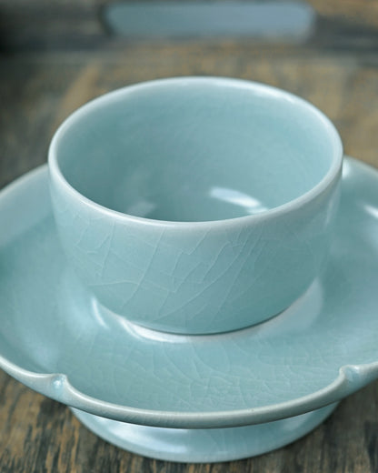 Saanwu Studio Ru ware porcelain teacup with matching saucer, inspired by Song dynasty floral rim tea stand.
