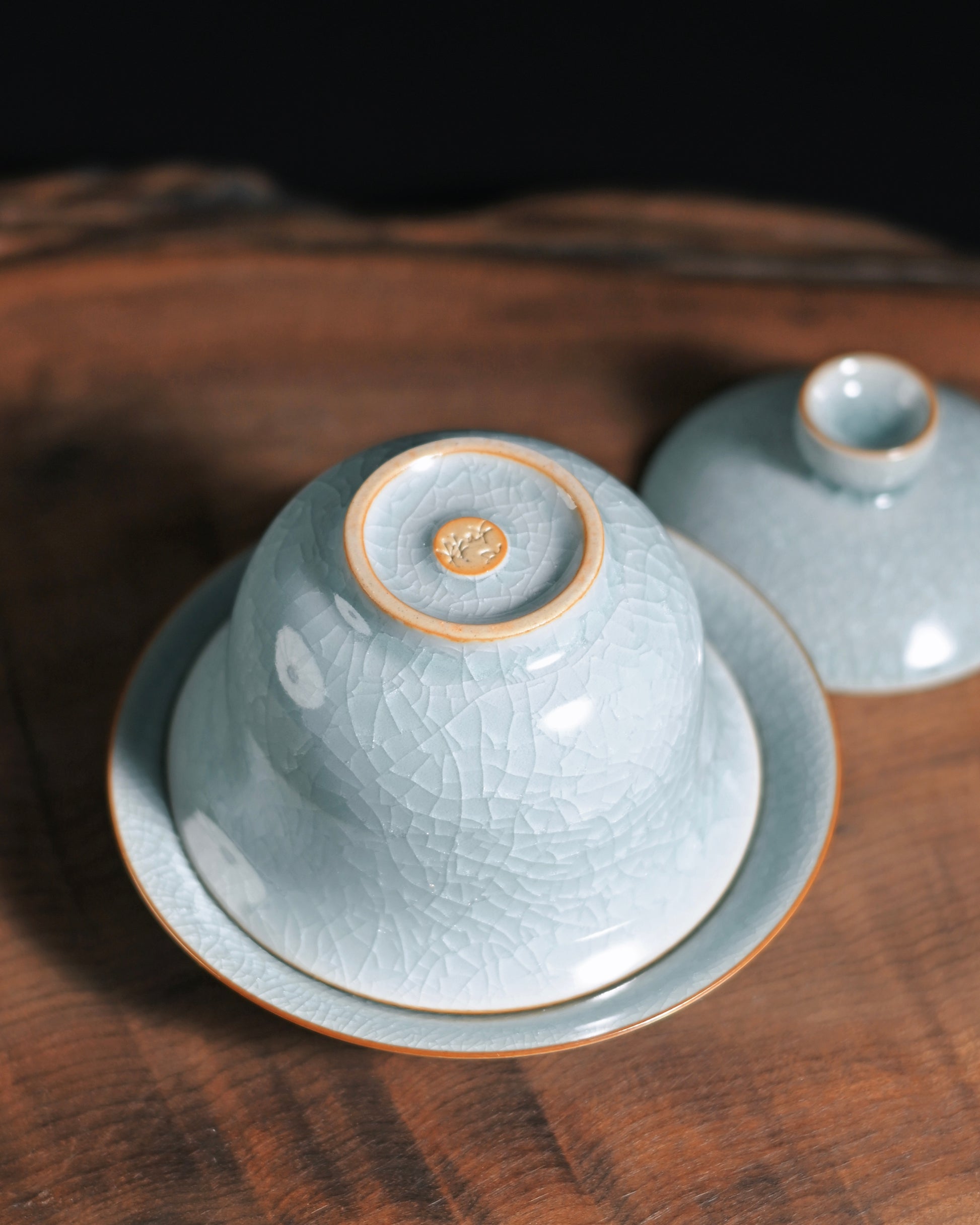 Detail of agate infused celadon glaze on Ru ware gaiwan