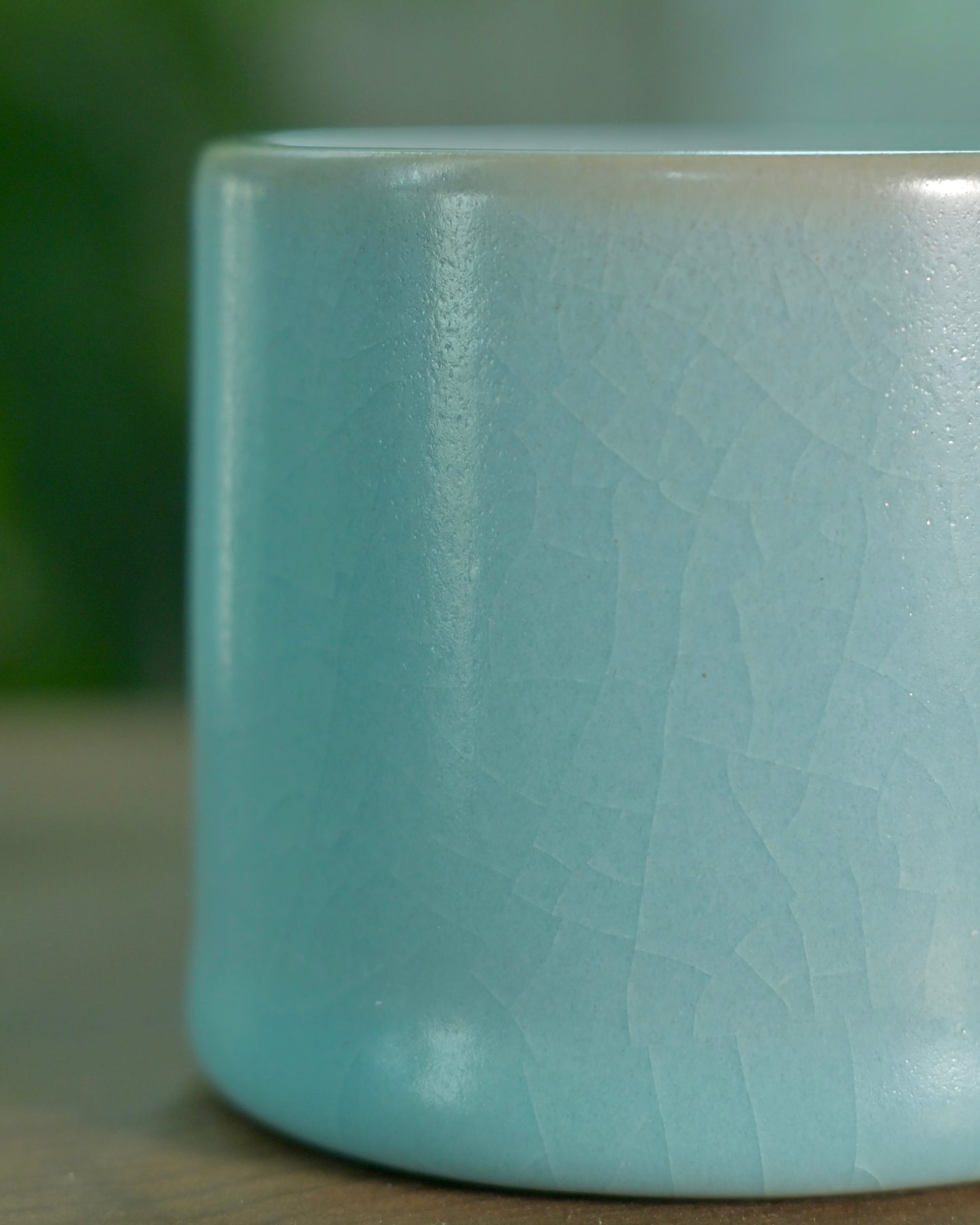 Jade-like celadon surface showing soft light transmission and smooth glaze texture
