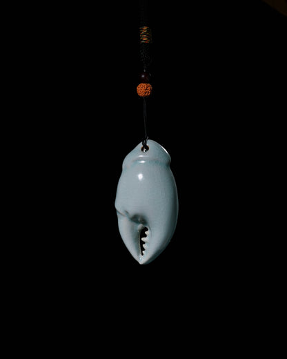 Mineral glaze ceramic surface showing subtle jade-like translucency under light